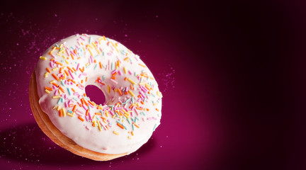 luxurious donut on a dark background with space for text