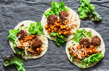 Meatballs, spicy stewed chickpeas and cabbage slaw tortilla -  delicious snack, brunch, appetizers,...