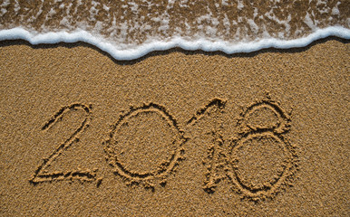 New Year 2019 is coming concept. Happy New Year 2019 replace 2018 concept on the sea beach