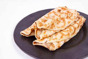 Pancakes stuffed with braised apples 