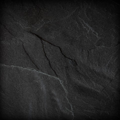 Dark grey black slate background or texture.