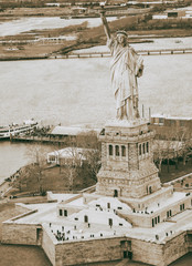 Overhead aerial view of Statue of Liberty from helicopter, New York City in winter © jovannig