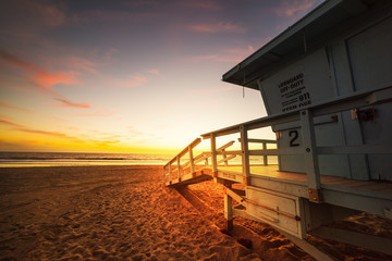 Lifeguard hut in world famous Santa Monica beach at sunset
