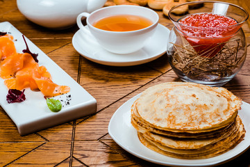 Stack of traditional russian pancakes blini. Russian food, russian kitchen