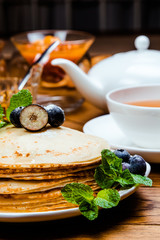 Stack of traditional russian pancakes blini. Russian food, russian kitchen