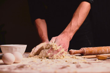 Obraz na płótnie Canvas hands kneading dough