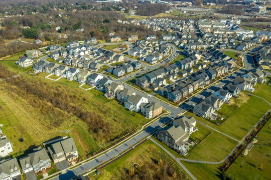 Aerial view of typical american colonial single family luxury home real estate neighborhood for upper middle class families in the USA