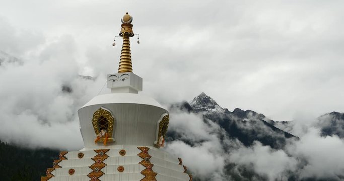 4k tibet buddhist white stupa,cloud cover mountain.