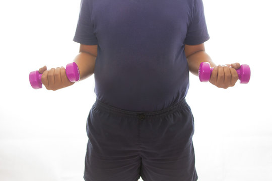 Concept fitness for fat man, fat man shows his muscle while holding dumbbell in hand