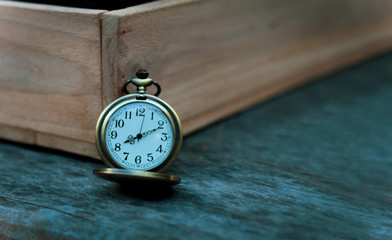 Pocket watch with wooden backgrounds, Pocket watch vintege.