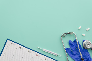 Doctor appointment. Medical clinic concept.Flat lay mockup with copy space advertisement template