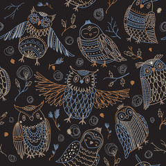 Fototapeta premium Cute owls seamless pattern in boho style with ornaments.