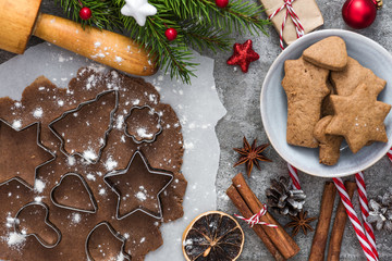 Christmas background. Ingredients for cooking Christmas gingerbread cookies with fir tree and decoration