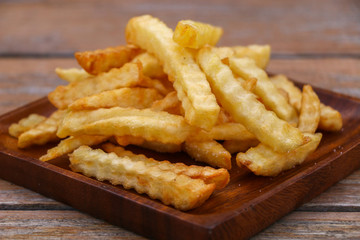 Zoom French Fries in cup on wood