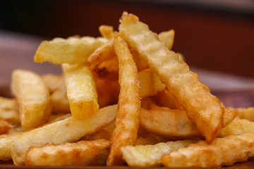 Zoom French Fries in cup on wood