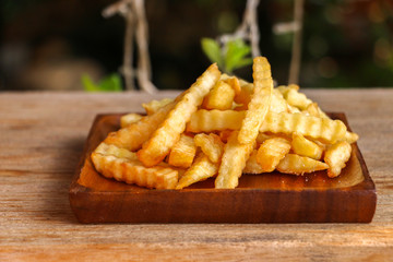Zoom French Fries in cup on wood