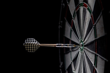 one dart in the center, bulls eye, 50