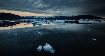 arctic summer landscape, with  icebergs photographed Greenland in Scoresby Sound fjords