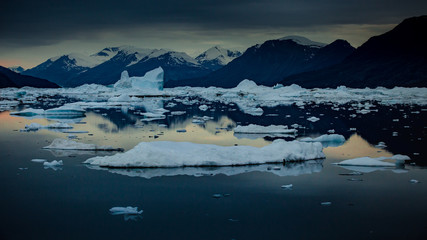  arctic summer landscape, with  icebergs photographed Greenland in Scoresby Sound fjords