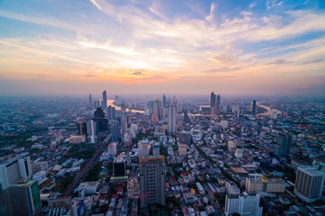 Cityscape sunset aerial view from top building, Aerial view of Bangkok city in Thailand