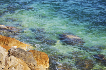 Rocks in the Mediterranean sea without waves