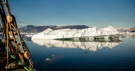 arctic summer landscape, with  icebergs photographed Greenland in Scoresby Sound fjords
