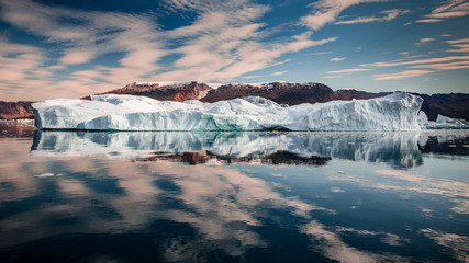 arctic summer landscape, with icebergs photographed Greenland in Scoresby Sound fjords