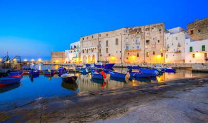 Fototapeta na wymiar Old port of Monopoli province of Bari, region of Apulia, southern Italy. Boats in the marina of Monopoli.