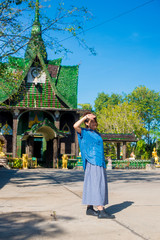 Asian female model poses for pictures in the outdoors