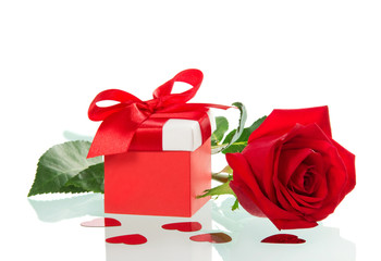 Colourful box with a gift on Valentine's day and red rose isolated