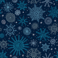 Vector christmas seamless pattern in ethnic boho style with ornaments.