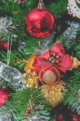Beautiful Christmas decorations hanging on a Christmas tree. Home decoration for Christmas
