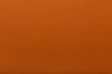 Texture of faux leather orange.