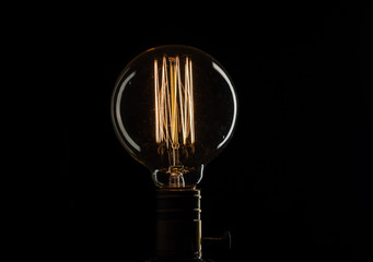Edison's light bulb illuminates from electric current