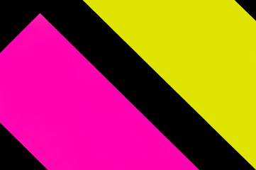 Yellow and purple hue colorful office stickers on black paper. Office noteparer as reminder....