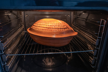 earthenware pot in the oven