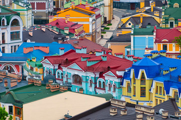 Fototapeta na wymiar Colorful roof tops of historic buildings.