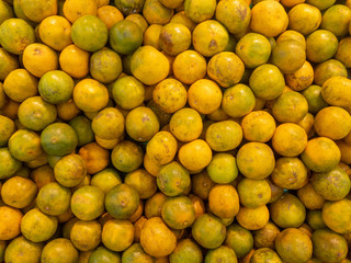 A lot of Thai oranges. 