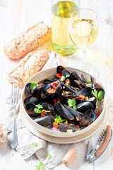 Delicious mussels served with cold white wine