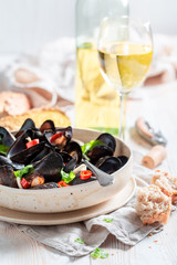 Enjoy your mussels with garlic and fresh coriander