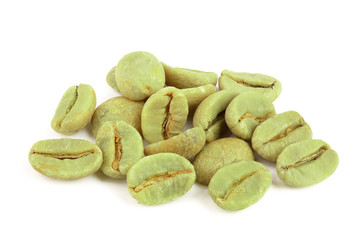 green coffee beans isolated on white background close up