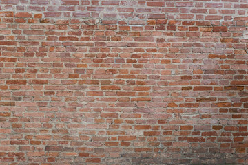 Red old brick wall background day time
