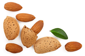 almonds with leaves isolated on white background with copy space for your text. Top view. Flat lay pattern