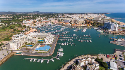 Aerial. View from the sky of the tourist town Vilamoura, Marina.