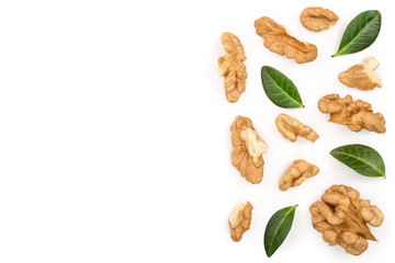 peelled Walnuts with leaves isolated on white background with copy space for your text. Top view. Flat lay