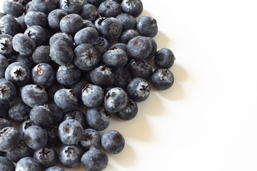 Fresh Blueberries on white wood background