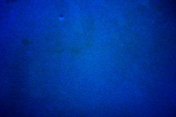Smudge on the blue carpet close up textured