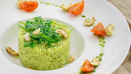 Salad with fresh vegetables in a white plate