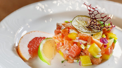 Fruit salad, dessert in a plate, dinner