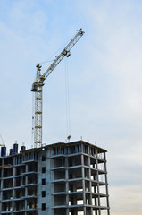 Fototapeta premium Multi-storey building. Construction of multi-storey residential building